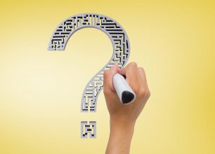 composite of hand drawing question mark graphic over yellow background